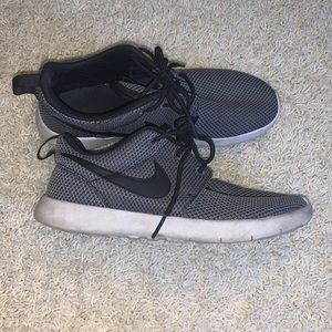 Grey Nike tennis shoes